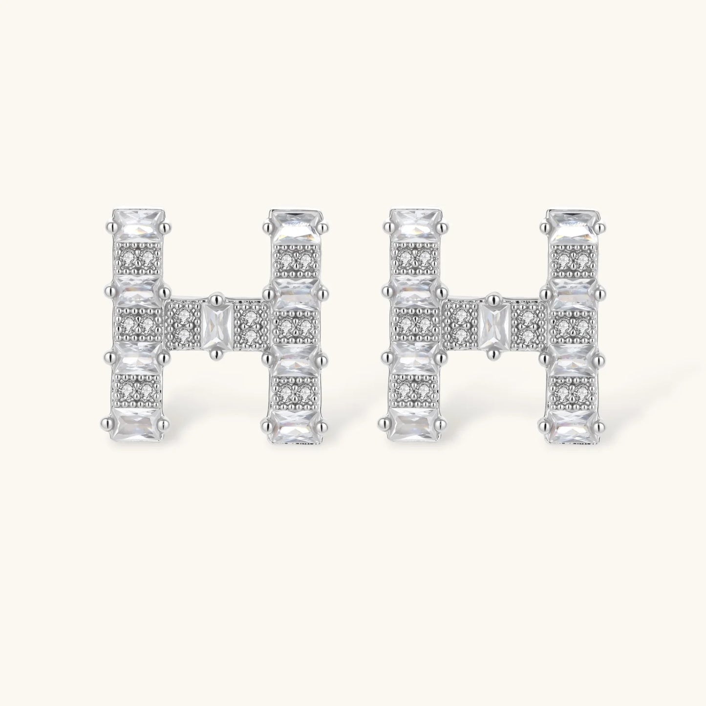 Letter H jewelry set featuring geometric crystal design in gold and white gold plated finish with adjustable chain necklace