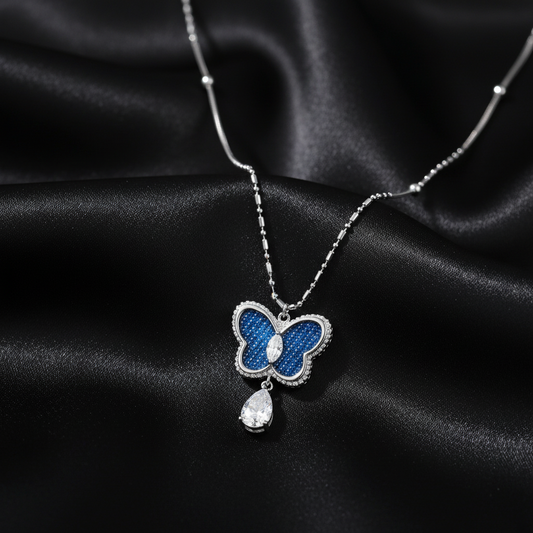 Azure Dream Butterfly Necklace on black silk background